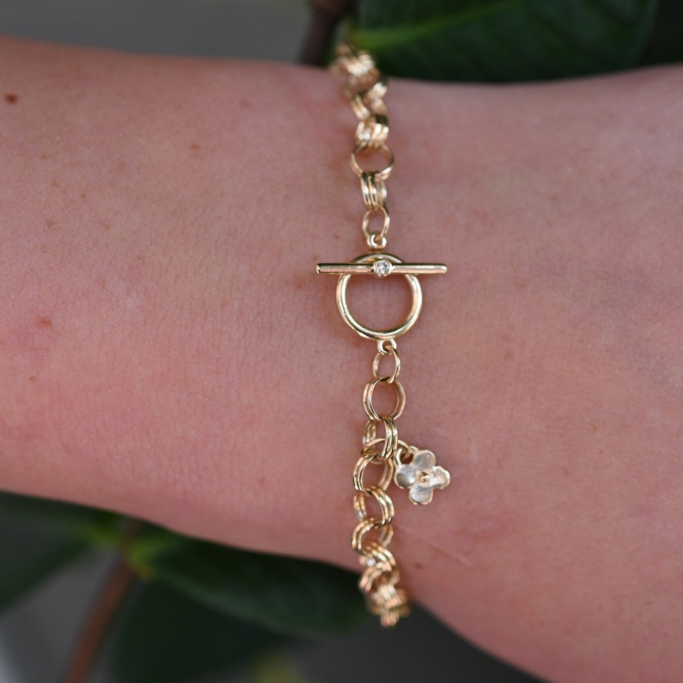 Charm Bracelet with Flower and Small Diamond Toggle