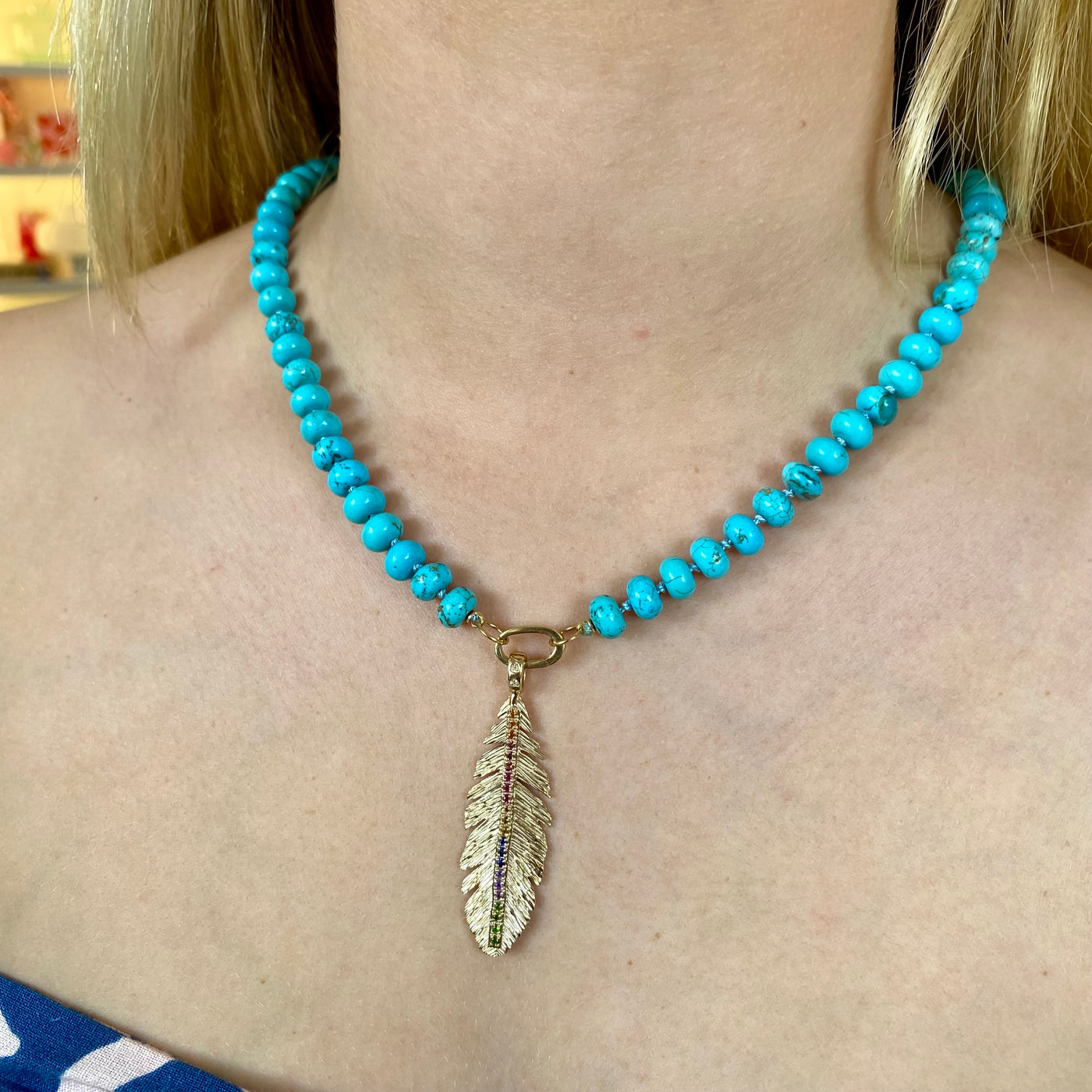 Gold Feather with Rainbow Gemstones
