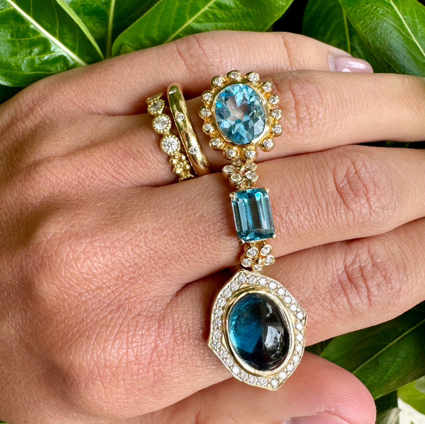Cala Lily double diamond and Blue Topaz Ring